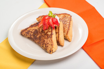 french toast with strawberry top