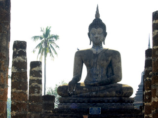 Obraz premium Buddha statue at archaeological site in Sukhothai historical park, tourist attractions and famous landmarks, Sukhothai province, Thailand. UNESCO world heritage city. On Sep 28, 2019.