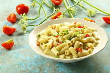 Vegetarian pasta penne with cream and cheese.