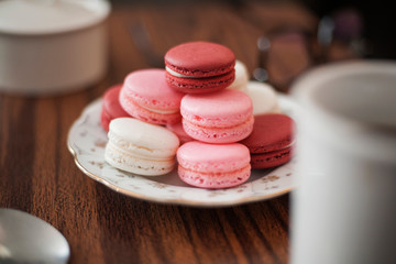macaroons on a table with coffee in home