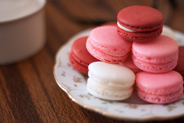 macaroons on a table with coffee in home