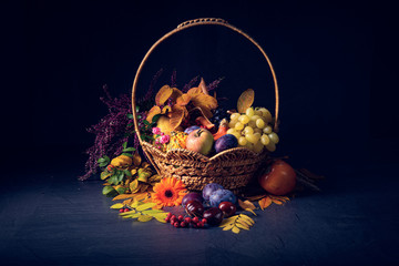 autumnal cornucopia in round basket