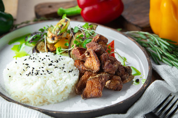 hearty lunch with rice and chicken