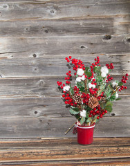 Fototapeta na wymiar Christmas arrangement decor on a rustic wood background