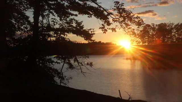 A scenic view of a sunset over Lake Norman in North Carolina.