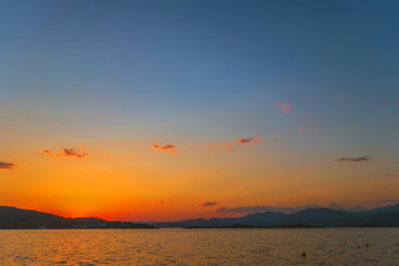 Seascape dawn over sea shore landscape paradise evening