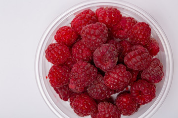 fresh raspberries isolated on white background