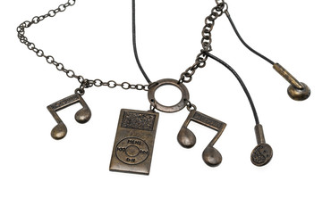 Fototapeta na wymiar pendant on a chain with musical notes, with a player and headphones