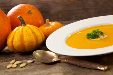 Rustic Pumpkin Soup And Pumpkins