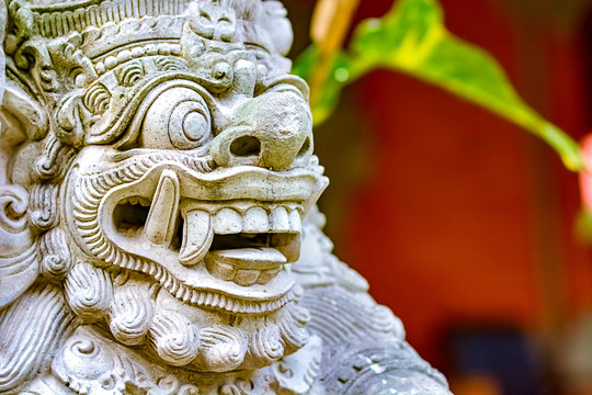 Bali statue of the gate guard Dwarapala, a warrior or fearsome giant