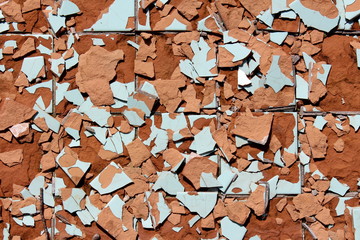 Mosaic of bunch of small broken kitchen tiles left at abandoned local construction site texture background wallpaper on warm sunny summer day