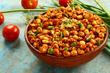 Bowl of roasted chickpeas, chana masala