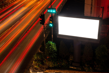 Naklejka premium Large billboards on the street at night, with beautiful street lights.
