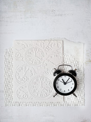texture paper with clock image embossing and clock alarm. creative design background. clock with dial surface texture paper background. copy space