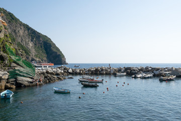 Fototapeta na wymiar Boats, Sailing Ships, on the port of Riomaggiore, Cinque Terre, La Spezia, Italy