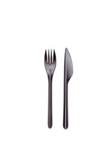 Black fork and knife isolated on white background. Disposable tableware. Flatlay. Fast food, eco and no plastic concept.