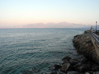 sunset on coast of sea