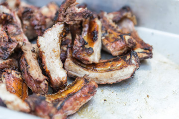 Closeup grill pork rib marinade with thai style spice and herbs, cooking meat