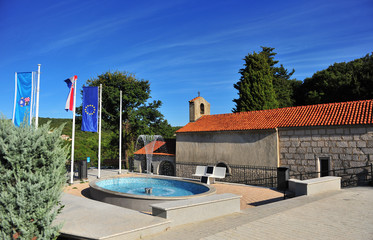 Old church on the square on Vrbnik town