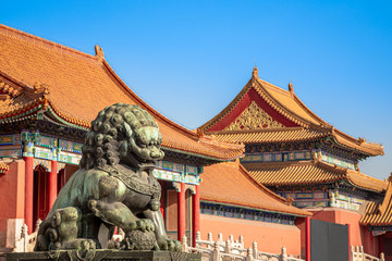 Fototapeta na wymiar Chinese guardian lion or shishi statue from Ming dynasty era, at the entrance to the palace in the Forbidden City, Beijing, China