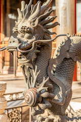 Fototapeta na wymiar Chinese Dragon statue from Ming dynasty era, at the entrance to the palace in the Forbidden City, Beijing, China