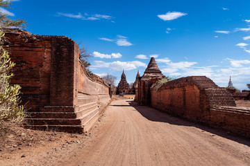 Ancient temple and pagoda in Bagan ,Myammar .This show Archaeological place of Myammar with blue cloud sky background.