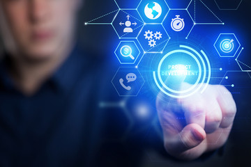 The concept of business, technology, the Internet and the network. A young entrepreneur working on a virtual screen of the future and sees the inscription: product development.