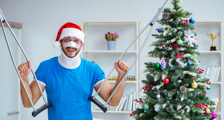 Injured man celebrating christmas at home