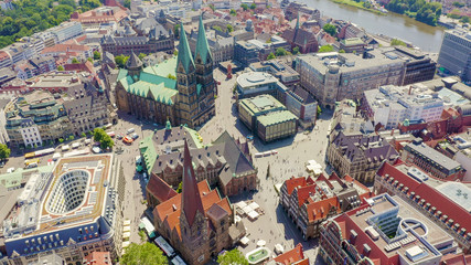 Bremen, Germany. Bremen Market Square ( Bremer Marktplatz ), Bremen Cathedral ( St. Petri Dom Bremen ). View in flight, Aerial View - obrazy, fototapety, plakaty