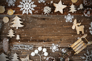 Frame Of Christmas Decoration Like Sled, Tree, Star, Fir Cone And Snowflakes. Brown Wooden Background With Copy Space