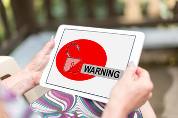 Warning concept on a tablet