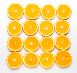 Fresh orange slices on white background
