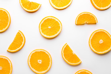Fresh orange slices on white background