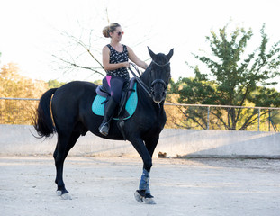 riding girl and horse