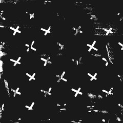 Textured graphic pattern with crosses. Black and white square backdrop.