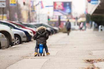 Boy walking in the street