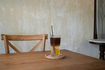 Signature drink of iced peach black coffee