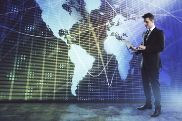 Businessman and world map hologram. Double exposure. Concept of international finance