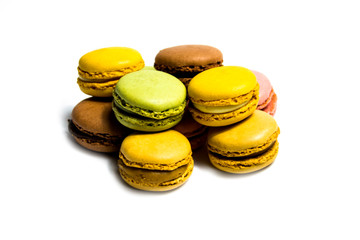 Colored macarons isolated on white background, typical French dish