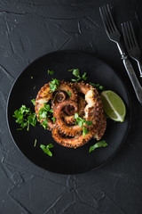 Grilled octopus with herbs and lime