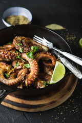 Grilled octopus with herbs and lime