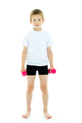 A little boy is lifting dumbbells.