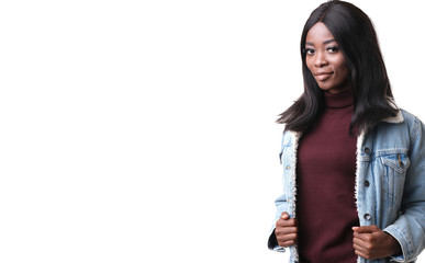 African model wearing jeans jacket with fur on set.