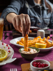 fried crispy braided cheese with mayonnaise sauce, lemon