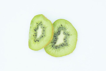 Ripe whole kiwi fruit and half kiwi fruit isolated on white background