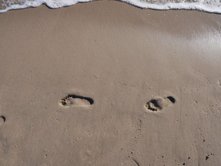 Empreinte de pieds sur sable