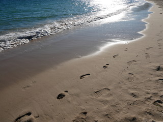 Mer Empreinte de pieds sur sable