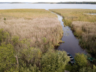 Reeds, boat and lake