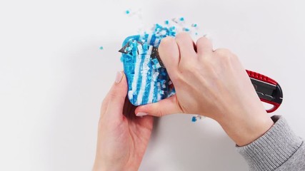 Soap cutting. Visual meditation. Woman cuts a bar of soap.