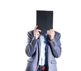 Mysterious men hiding himself behind the book on white background